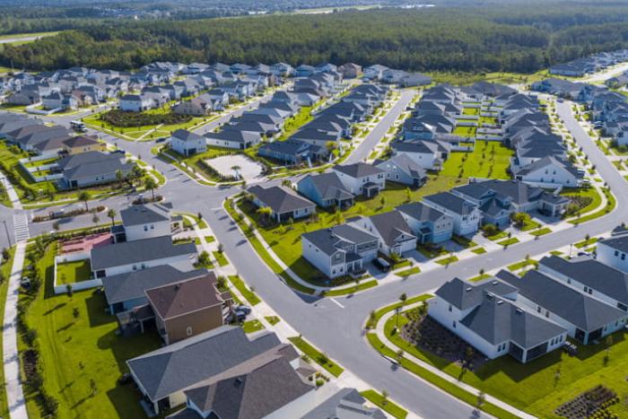 Aerial view of the vacation home neighborhood streets and lawns at Storey Lake Resort