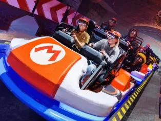 Guests riding Ride Mario Kart™: Bowser's Challenge at Universal Epic Universe