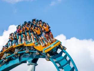 Guests on Pipeline: The Surf Coaster at SeaWorld Orlando
