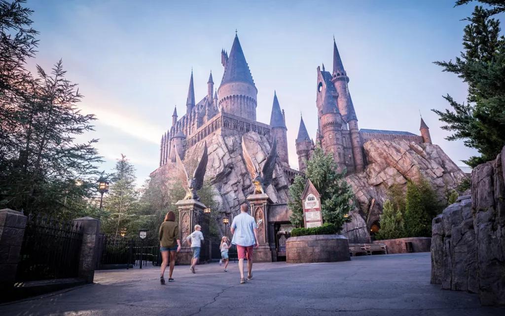 A family walking towards Hogwarts Castle