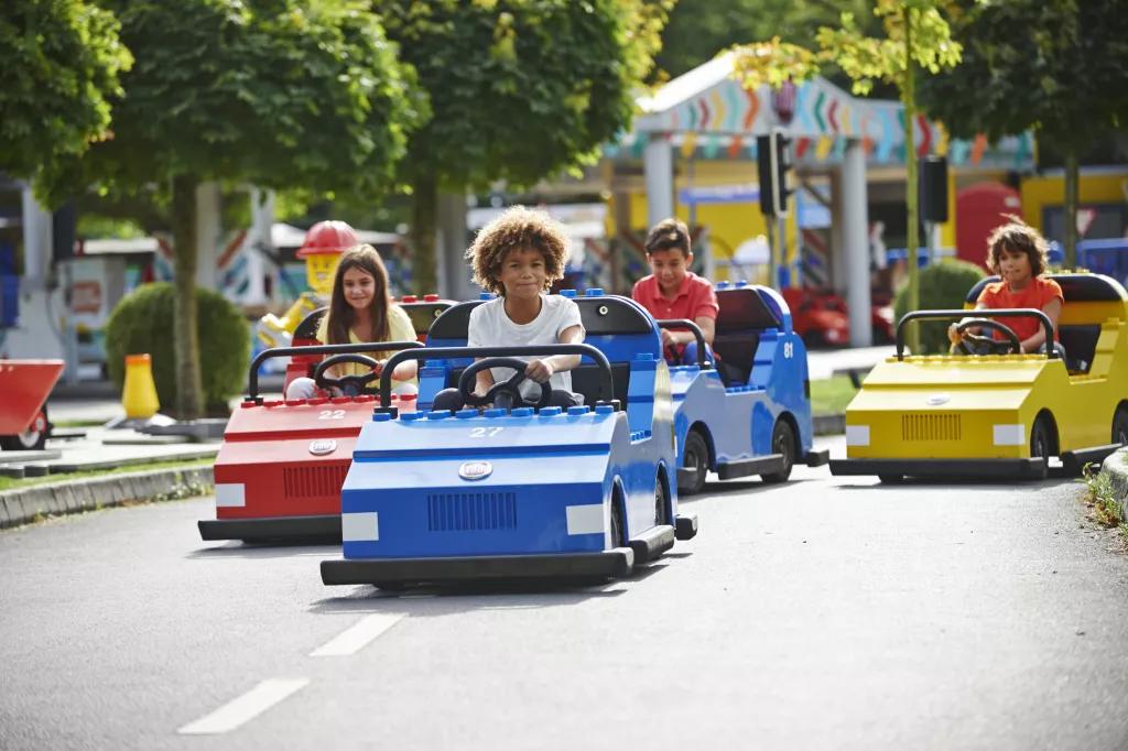 Children driving cars that look like lego cars at Legoland