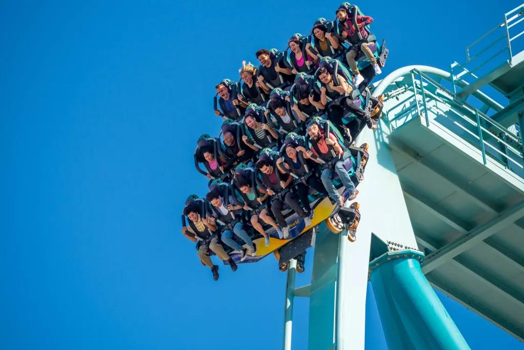 Guests in a ride vehicle at the top of the Emperor rollercoaster drop