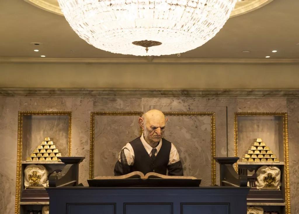 A goblin animatronic in the lobby of Gringotts Bank