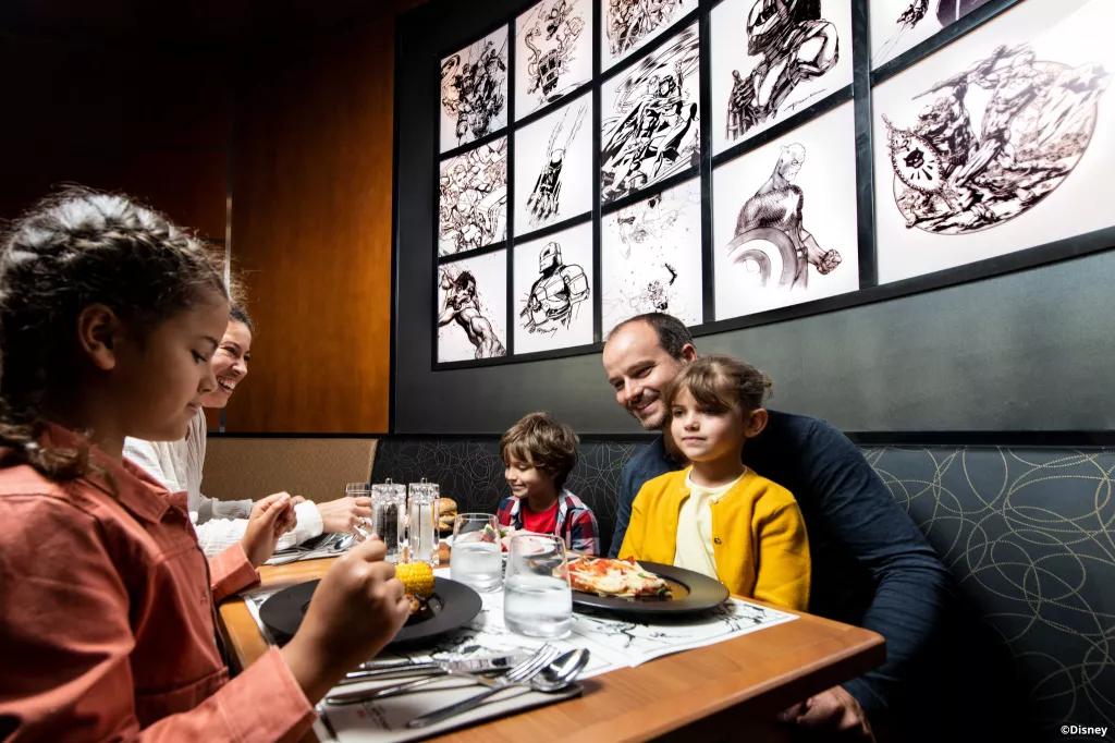 A family eating dinner at the Downtown Restaurant in Disneyland Paris