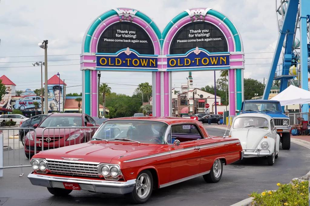 A row of classic cars at the Old Town Classic Car Show
