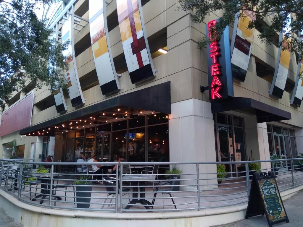 Outdoor seating area at RusTeak restaurant 