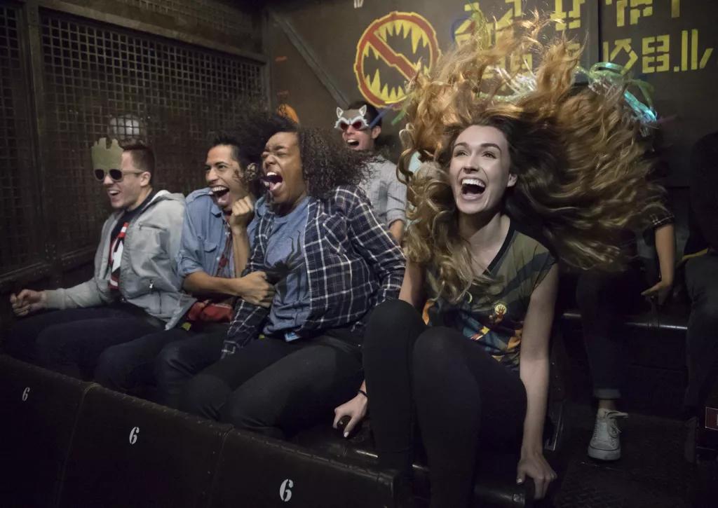 Guests screaming and clinging on to their seats while riding Guardians of the Galaxy: Mission Breakout