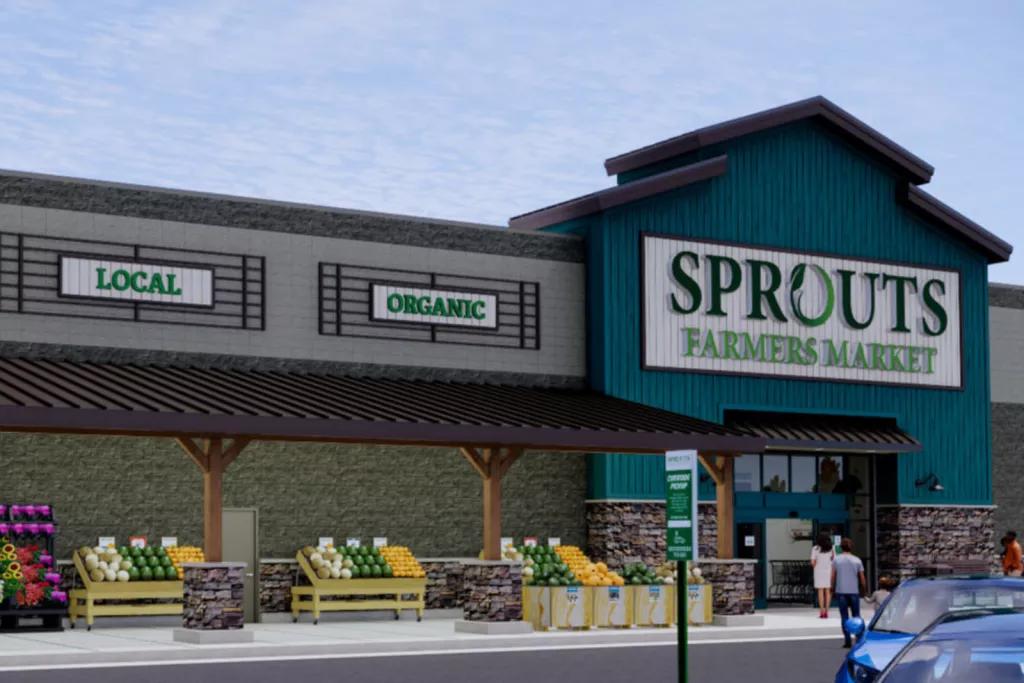 Concept art of the entrance to a supermarket with a sign above the door reading "Sprouts Farmers Market"