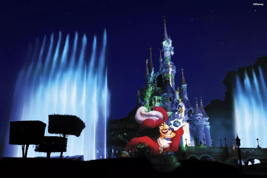 A projection of Captain Hook on Sleeping Beauty Castle 