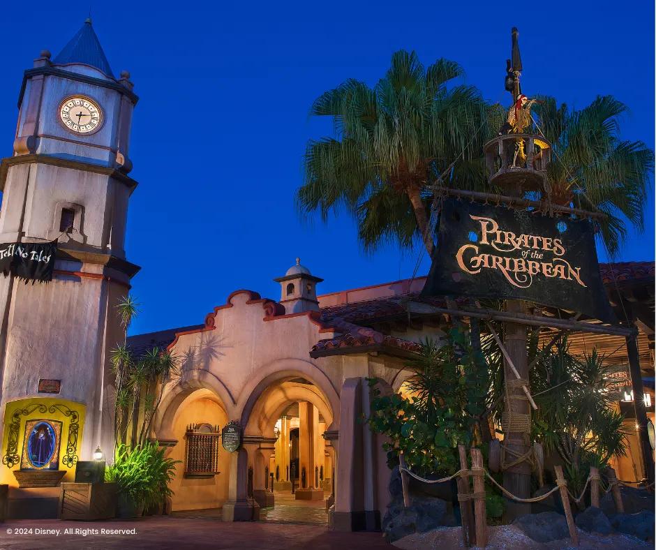 Sign shaped like a pirate sail with the name of the ride outside of Pirates of the Caribbean 