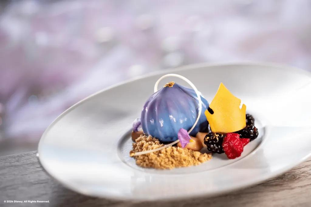 A plate of dessert themed to Disney Princesses