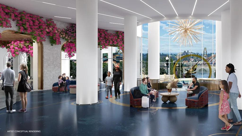 Guests sat in white lobby with a gold chandelier hanging over their heads and pink bunches of flowers dangling. There is a large window in the background with Epic Universe peaking through.