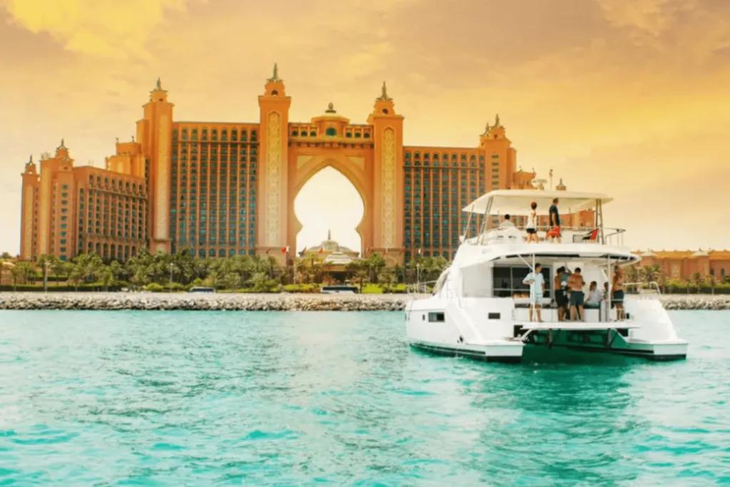 A large yacht sailing towards The Palm in Dubai