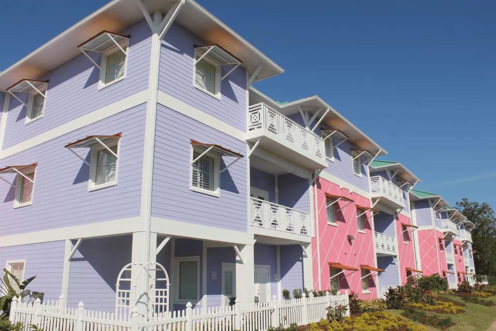 Pastel coloured hotel rooms, pink and purple, which are wheelchair accessible.