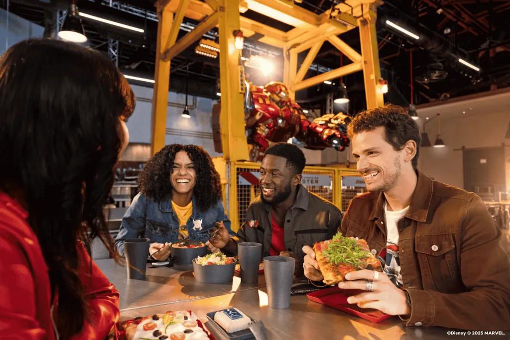 A group of friends eating in Stark Factory at Disneyland Paris