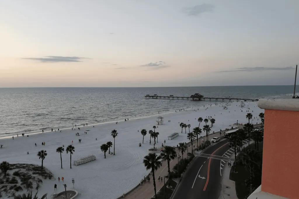 A sandy beach at sunset