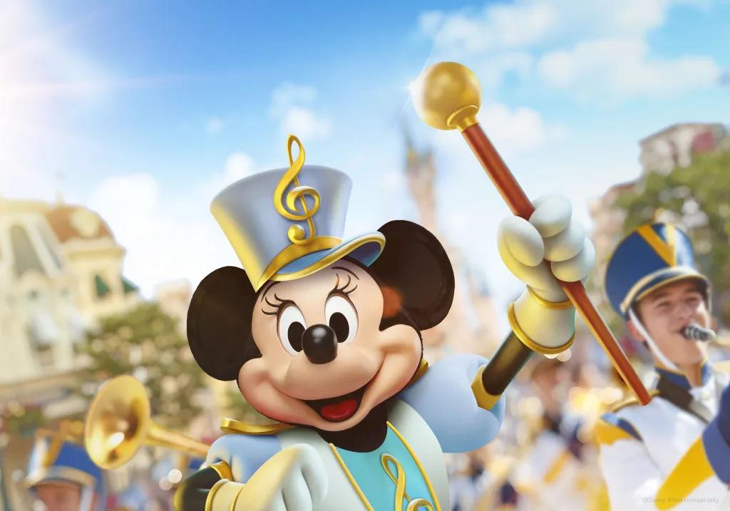 Minnie Mouse dressed in a marching band costume including a hat with a music note on it.