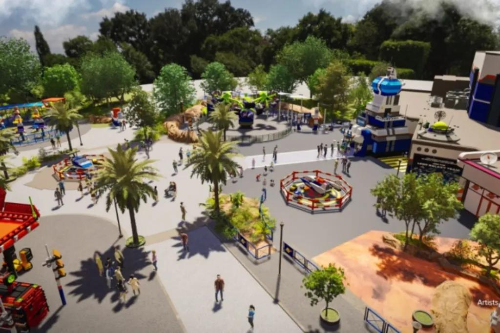 Artist concept art of large space in theme park with small rides and LEGO statues dotted around.