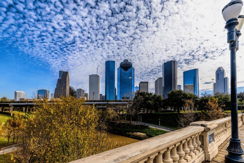 A sunny city with lots of high-rise modern buildings.
