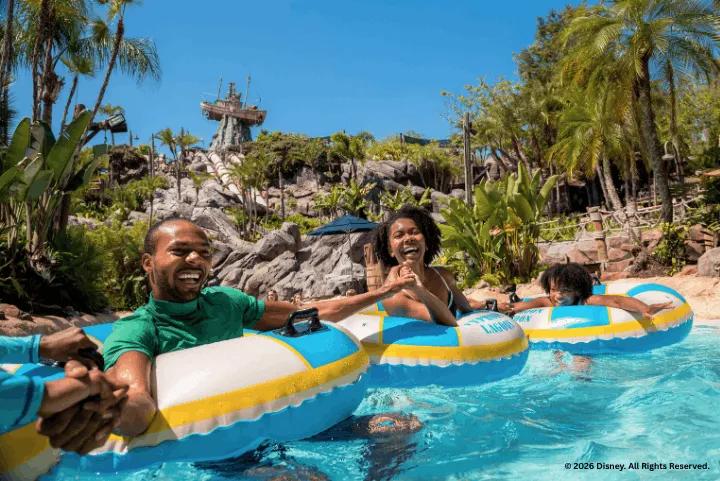 A family in inflatable rings in a pool at Disney's Typhoon Lagoon Water Park