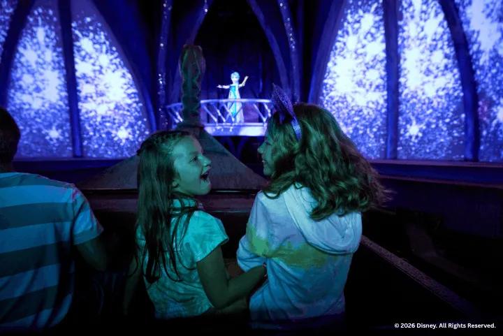 Two girls on the Frozen Ever After ride at EPCOT
