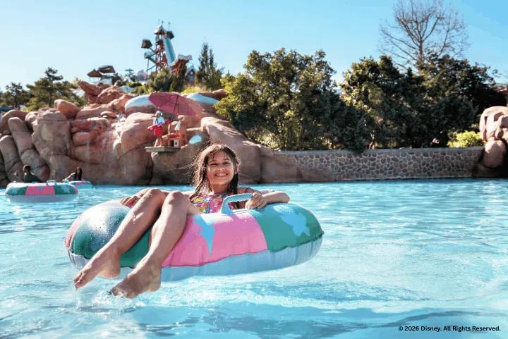 A girl in an inflatable ring at Melt-Away Bay, Disney's Blizzard Beach Water Park