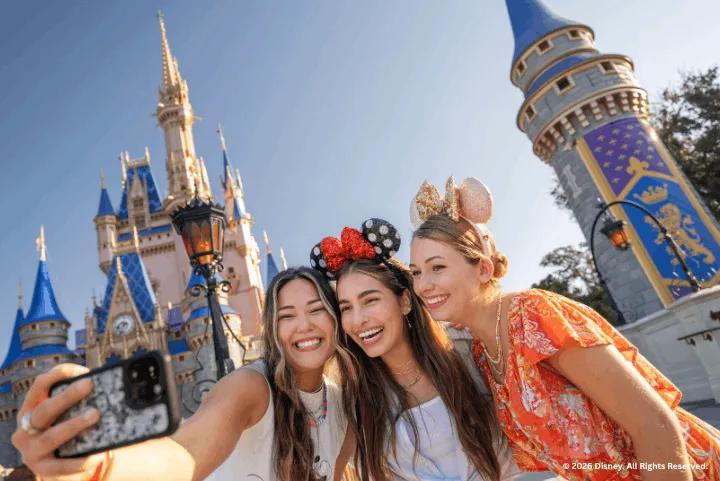 Guests taking a selfie at Cinderella Castle