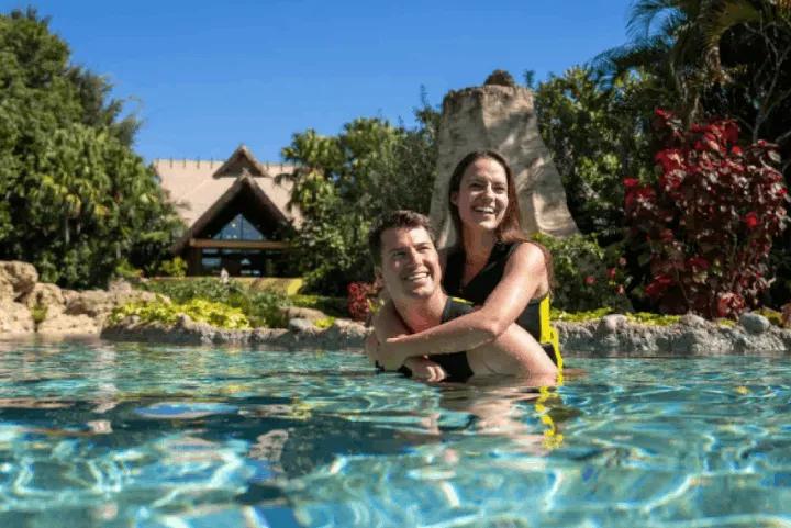 A couple enjoying the water at Discovery Cove