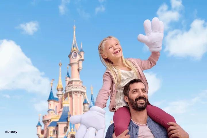 Father and daughter in front of Sleeping Beauty Castle