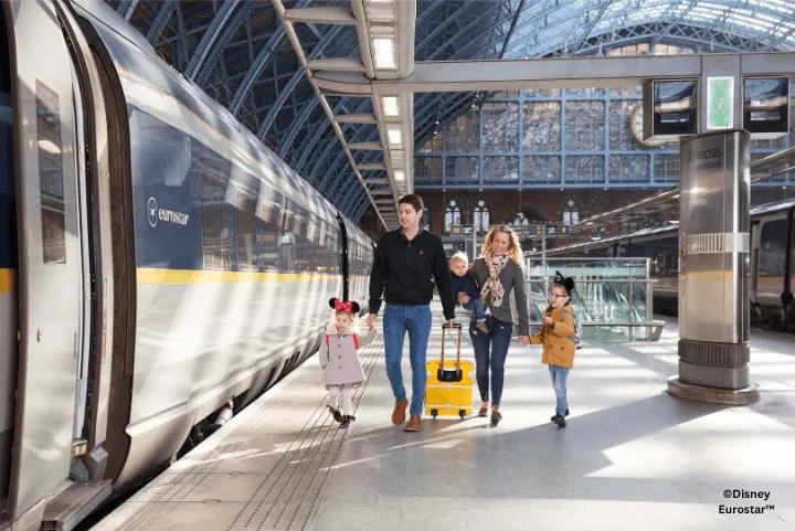 Guests walking alongside a Eurostar train