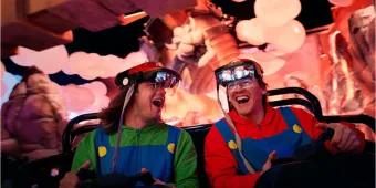Happy guests enjoying a thrilling, immersive, and high-tech ride experience inside Universal Orlando Resort, showing how modern attractions are designed for diverse guest enjoyment and accessibility.