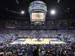 A crowded stadium watching an Orlando Magic basketball game