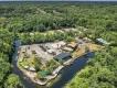 An aerial view of a recreation centre surrounded by a water way used for watersports