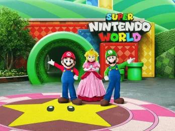 An artist rendering of Mario, Luigi and Princess Peach standing in front of the entrance to Super Nintendo World at Universal Studios Hollywood