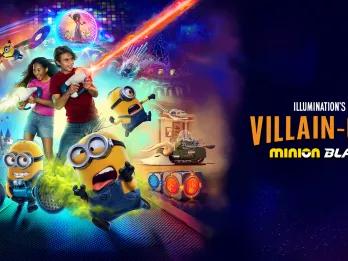 Two children using blasters to shoot imaginary lasers, surrounded by Minions
