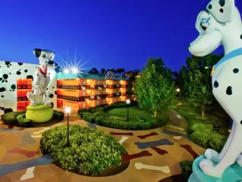 A motel-style building with giant dalmation statues at either side