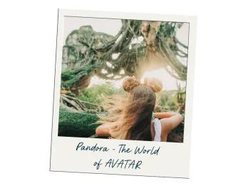 Image of guest stood with their back to the camera wearing mickey ears which have giraffe spots on them in sequins. Ahead of the girl there are floating mountains in the sky with thick tree vines hanging from them.