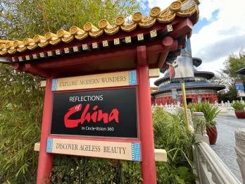 A sign for a theme park attraction called Reflections of China