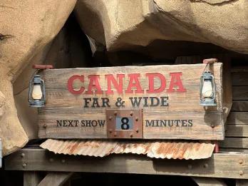 A sign for a theme park attraction called Canada Far and Wide