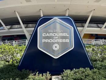 A sign outside of a theme park ride called The Carousel of Progress