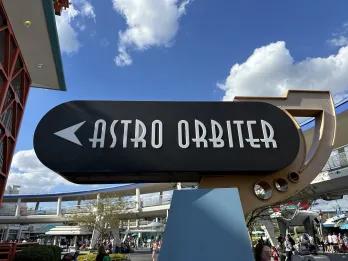A sign outside a theme park ride called Astro Orbiter