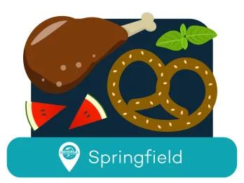 Pretzel, turkey leg and watermelon slices. The location is Springfield.