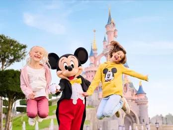 Guests with Mickey at Disneyland Park in Paris