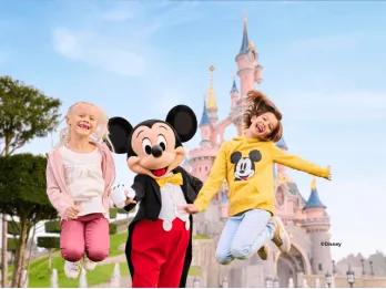 Guests with Mickey Mouse, Disneyland® Park