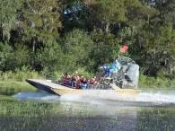 Guests enjoying an airboat ride at Boggy Creek Orlando