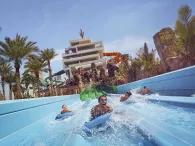 Friends riding Hydra Racers at Aquaventure Dubai