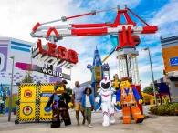LEGOLAND California guests and LEGO cast members in front of LEGO Movie World