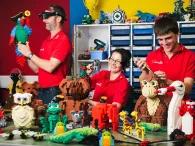 people-building-lego-models