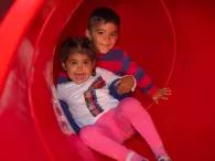 children-in-slide-tunnel