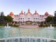 Looking over a large fountain towards the exterior of the Disneyland Hotel 